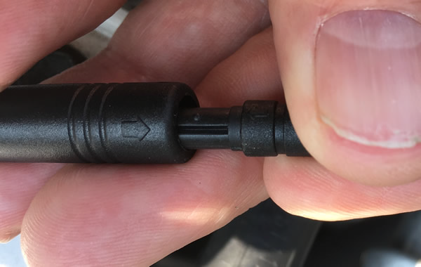 Closeup of the LED Driver union, slotting into the Corolla headlight connector.