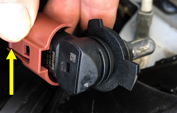 Macro showing the connector union, on a HID globe in the Corolla.